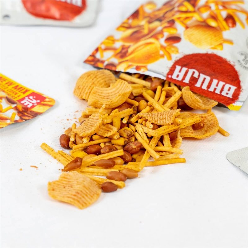 Indulge in the ultimate snack pairing with Majans Bhuja Beer Mix Snack Bag 160g. Featuring a flavorful blend of crunchy nuts, savory pretzels, and zesty seasoning, this convenient bag is perfect for enjoying with your favorite brew. Elevate your snacking experience with Majans Bhuja Beer Mix today!
